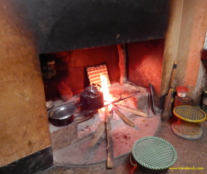 A warm fire burns in K's kitchen