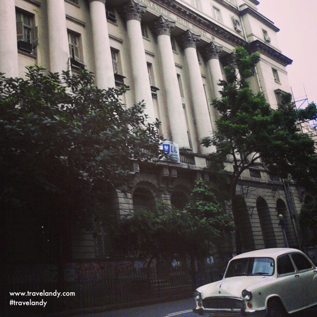 Kolkata has beautiful colonial buildings. And there's the iconic Ambassador car is also in the frame