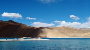 Pangong under a mostly blue sky. 