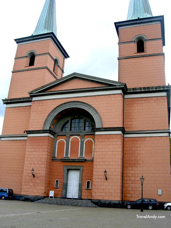 The orange church with two pointy tops