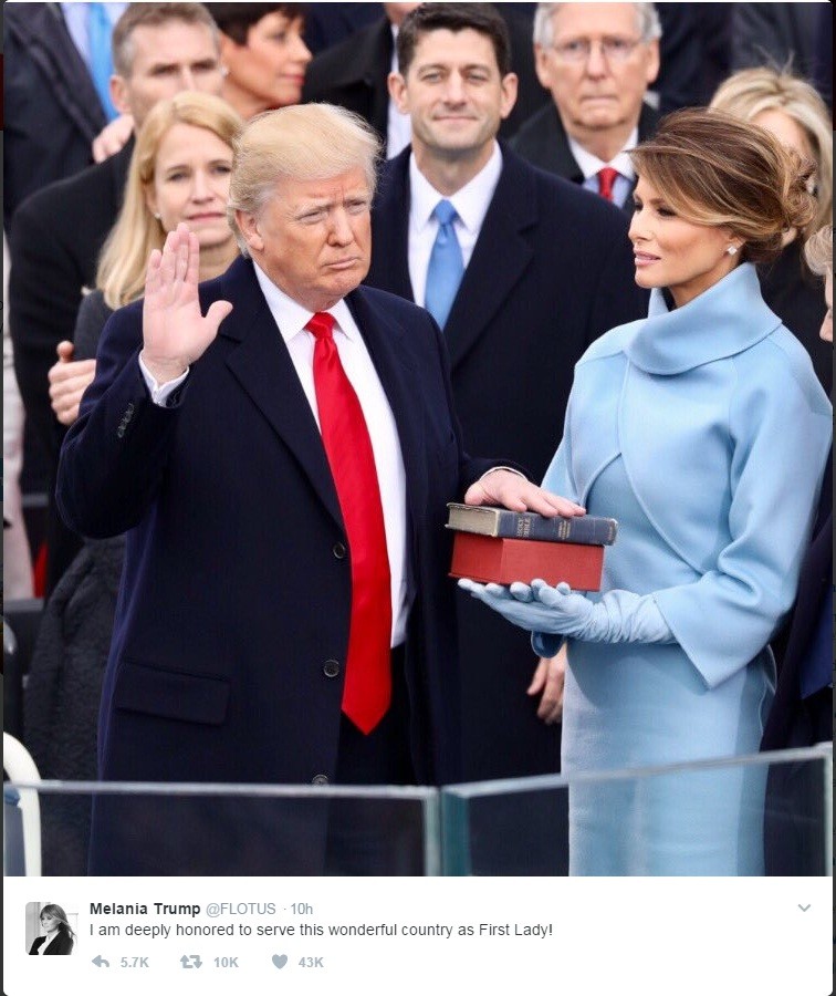 Melania hold the Bible while husband Donald Trump takes oath as US President. (Picture: twitter.com/FLOTUS)